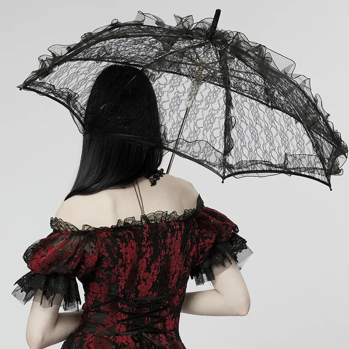 model holding parasol