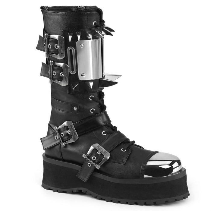 outer side view of black vegan leather 3/4" platform Silver chrome plated metal toe cap Lace-up mid-calf boot Features buckle straps & cuff Features large silver chrome plate with large and small claw spikes and inside metal zip closure