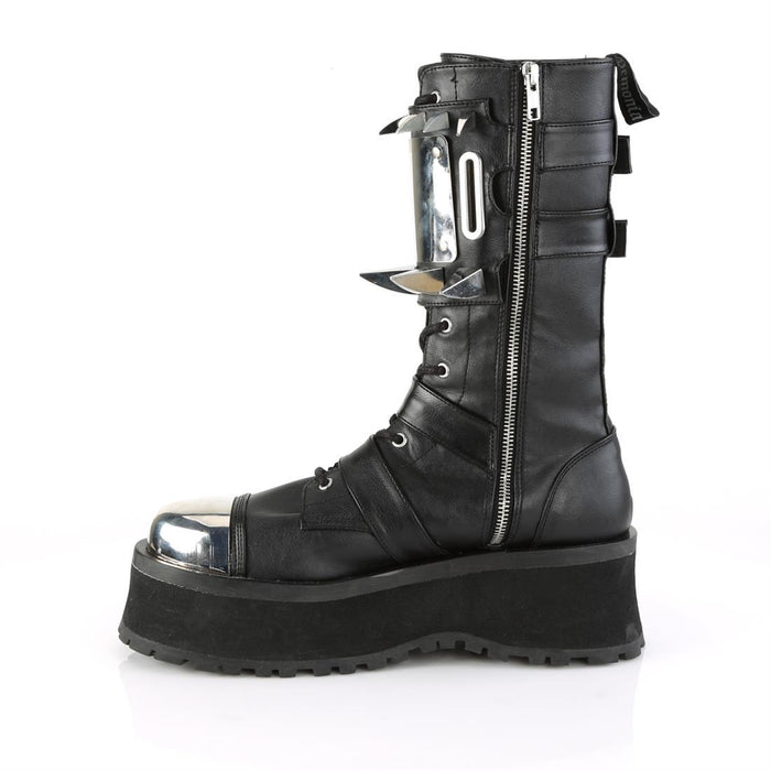 left side view of black vegan leather 3/4" platform Silver chrome plated metal toe cap Lace-up mid-calf boot Features buckle straps & cuff Features large silver chrome plate with large and small claw spikes and inside metal zip closure