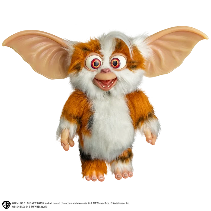 Toy figure of a character with large ears on a white background