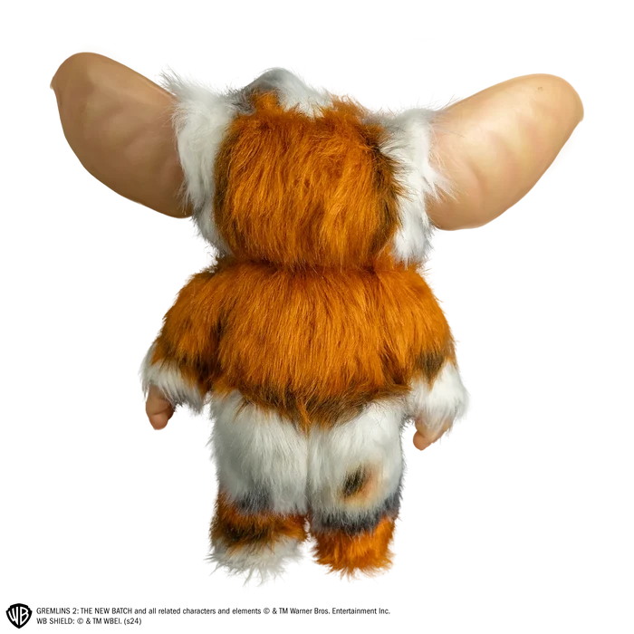 Toy figure of a character with large ears on a white background