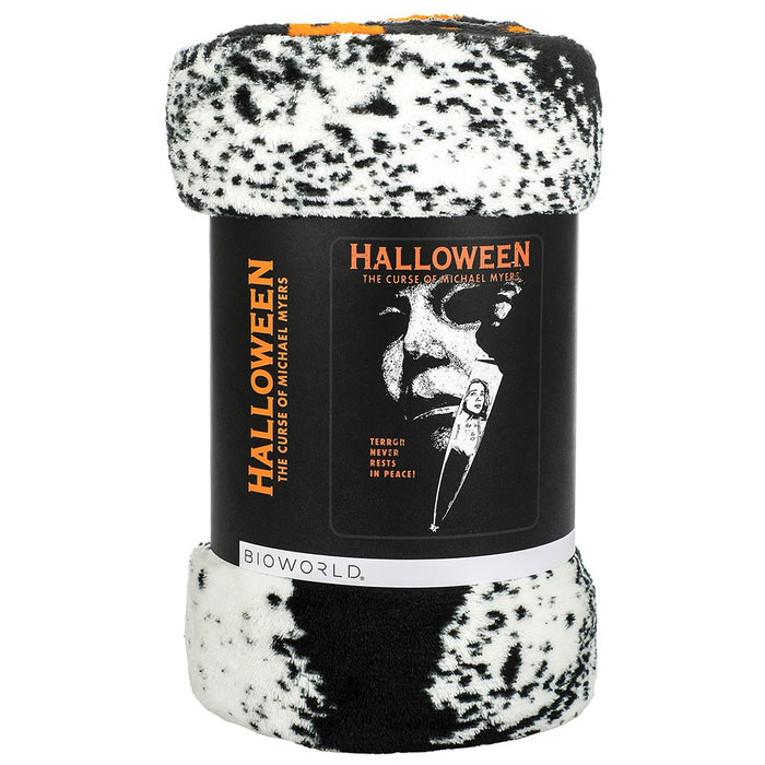halloween movie poster fleece throw blanket with text that reads "halloween the curse of michael myers. terror never rests in peace"