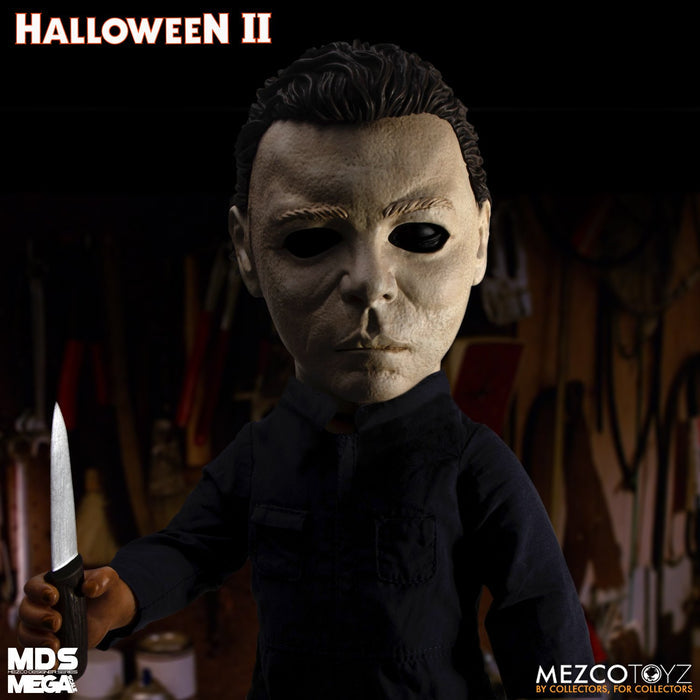 Doll wears tailored, weathered coveralls, features 11 points of articulation, and comes complete with a butcher knife accessory that fits neatly in his right hand.