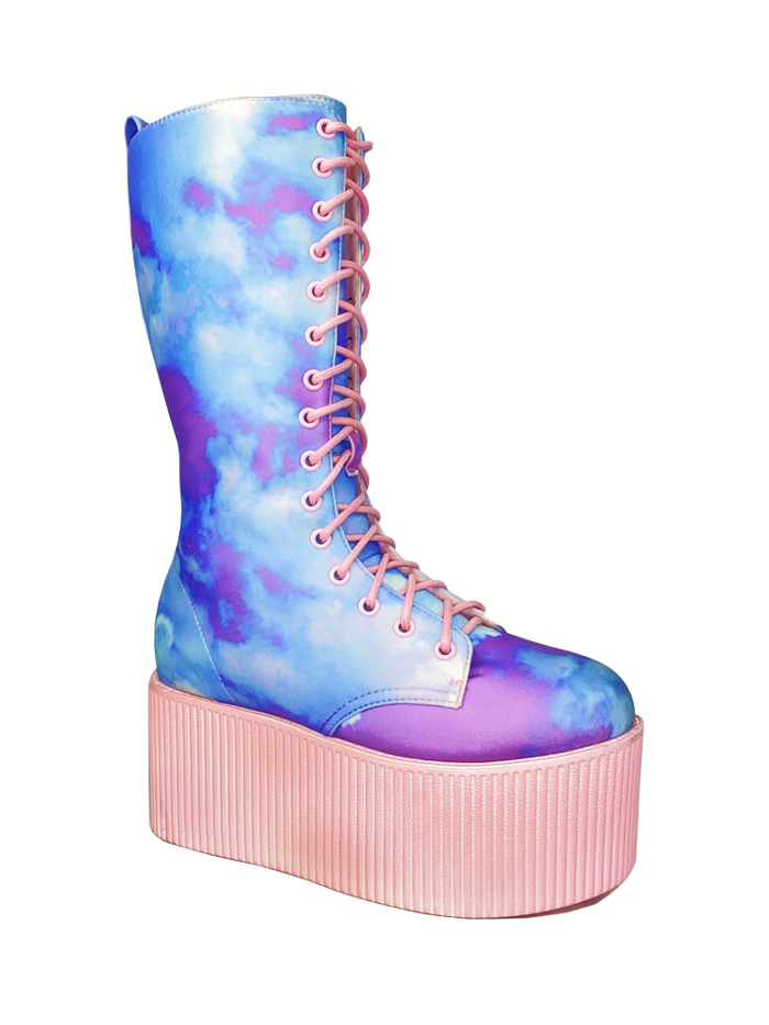 outer view of printed blue, purple, pink pastel upper, pink molded outsole, pink enamel eyelets and pink round lace boot. Boot has full lace-up front and full inner side zip.