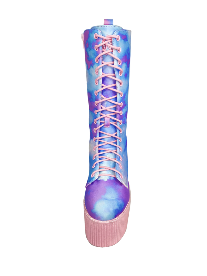 front view of Printed blue, purple, pink pastel upper, pink molded outsole, pink enamel eyelets and pink round lace boot. Boot has full lace-up front and full inner side zip.