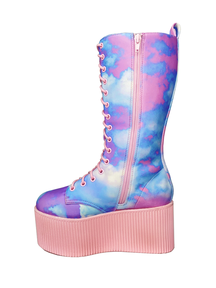 inner view of Printed blue, purple, pink pastel upper, pink molded outsole, pink enamel eyelets and pink round lace boot. Boot has full lace-up front and full inner side zip.