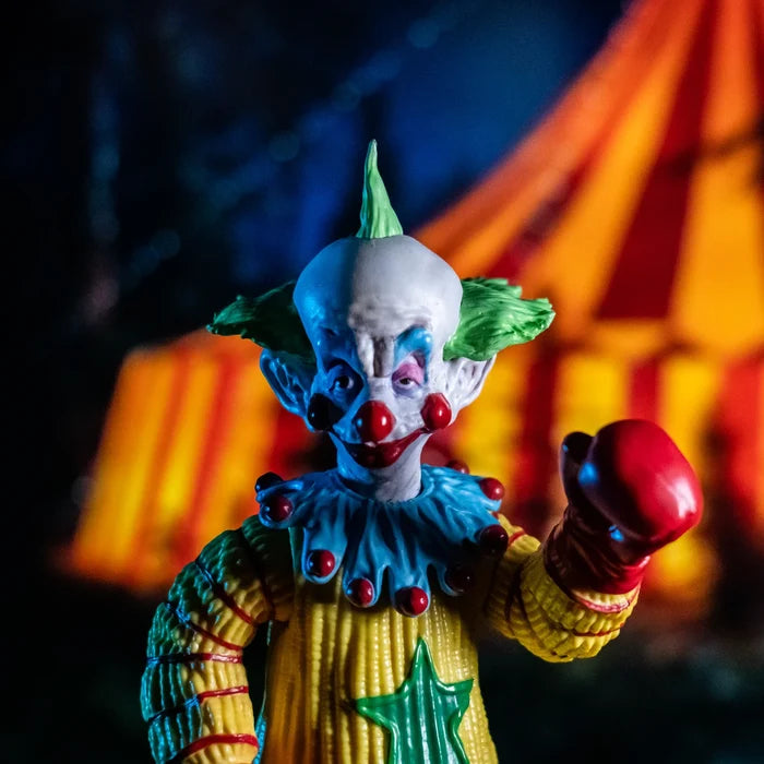 front of figure on display
