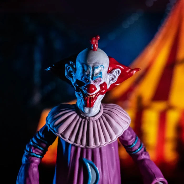 front of figure on display