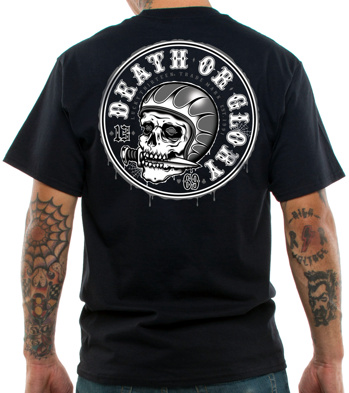 back of Black Lucky 13 t-shirt with a full back screen print of the "Knife Fight" graphic of a helmet-wearing skull with a knife in his mouth and Death Or Glory wrapped around the top. The front left chest has LUCKY 13 on it.
