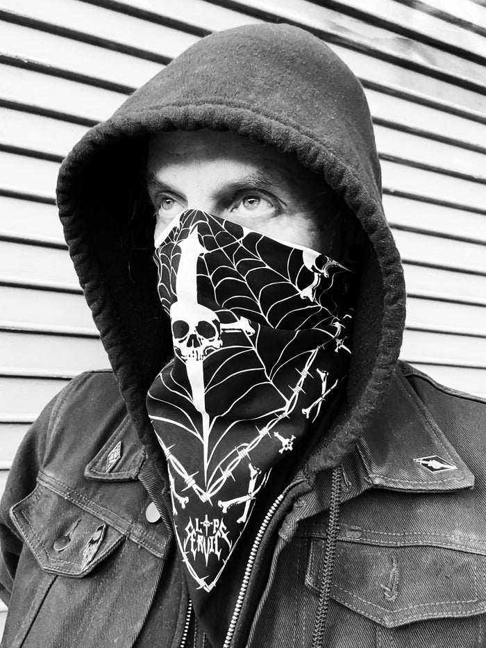 Black and white classic Lip Service logo bandana. Bandana has spider webs, barbwire, cross bones and daggers.
