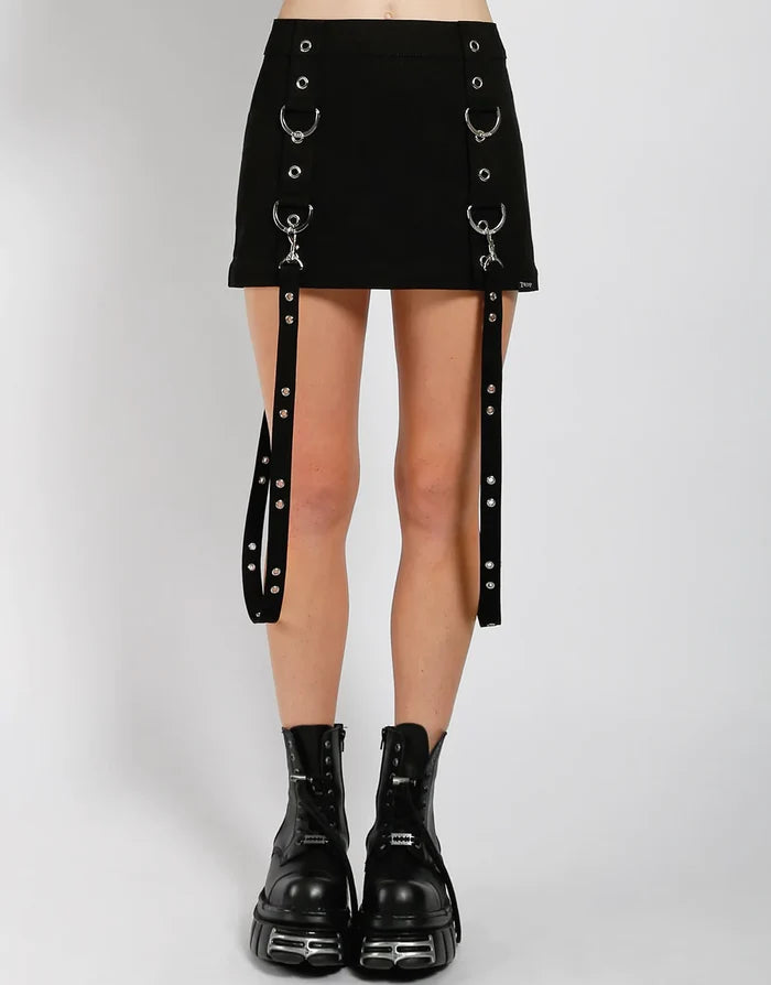 model showing front of skirt, zipped off into shorter skirt