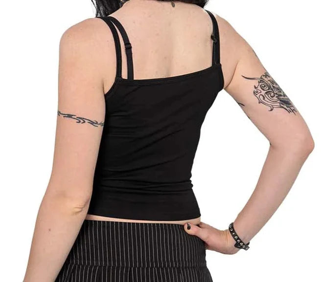 Model wearing a black tank top with white text that says 'LOVE SEX ROMANCE' on a white background