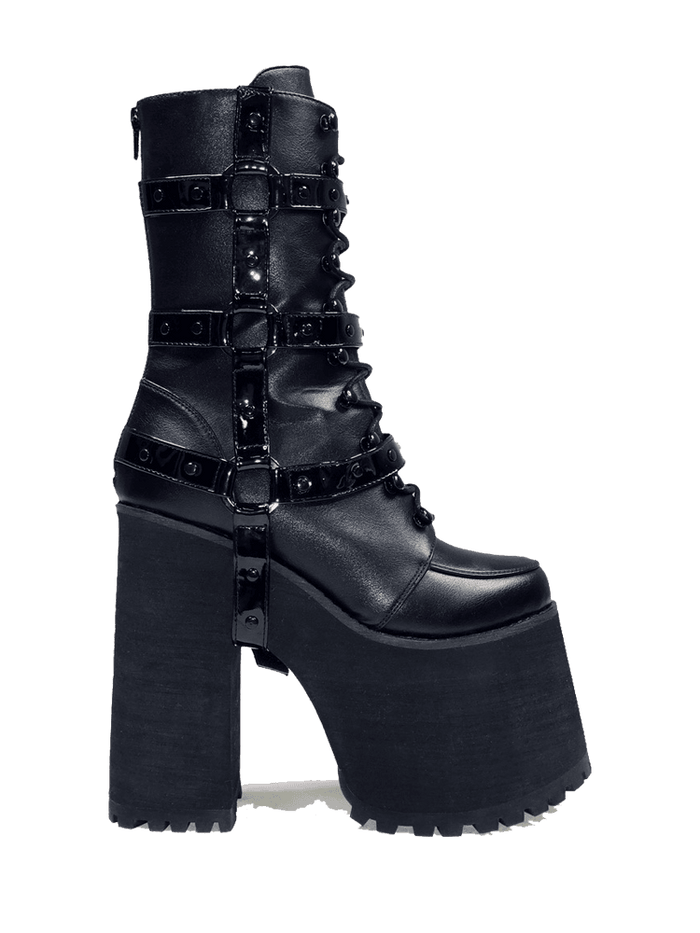 Black vegan leather super tall 6" heel boot with black vegan patent leather O ring straps on the side, black enamel hardware and EVA bottom. Boot has full lace-up front and full back zipper.