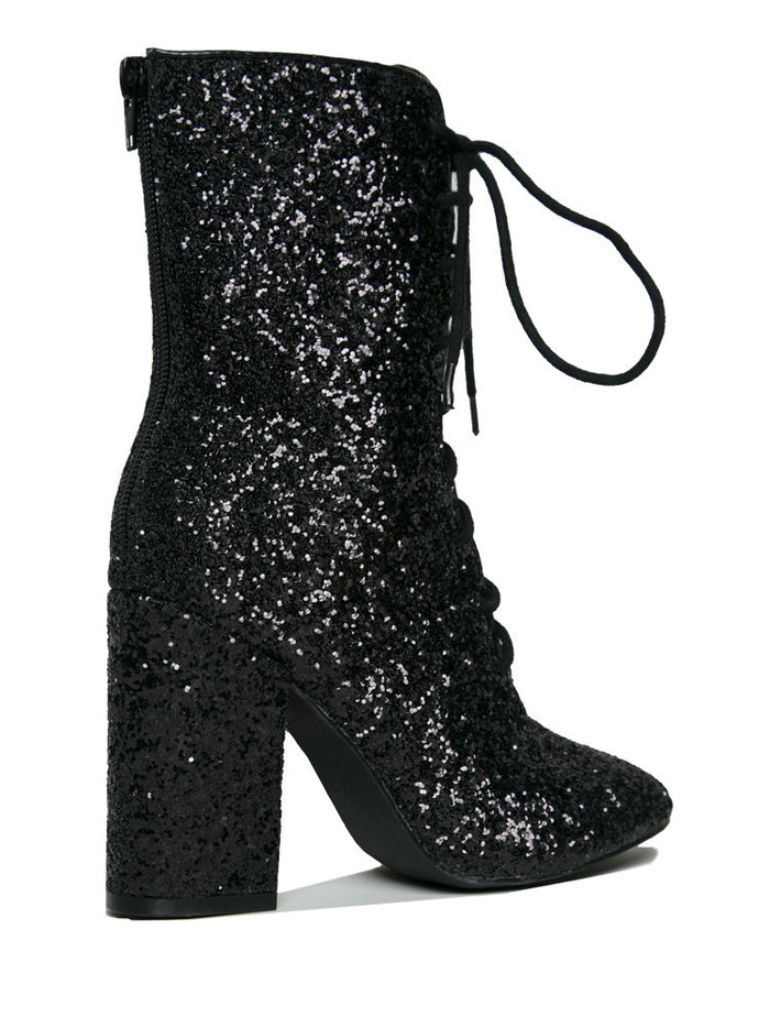 Outer view of Black glitter lace up front bootie boot.