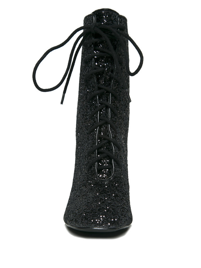 front view of Black glitter lace up front bootie boot.