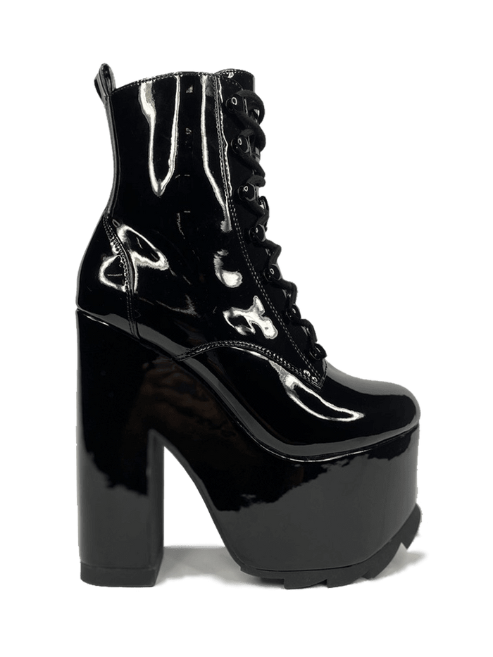 outer view of Black vegan shiny patent leather tall military style platform boot with black cotton laces and black inner zipper. Front of platform has a fanned grip for better stability when walking.