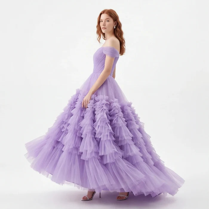 Woman wearing a purple gown on a white background