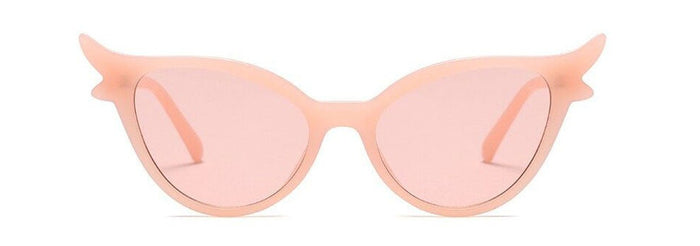 front of glasses on display