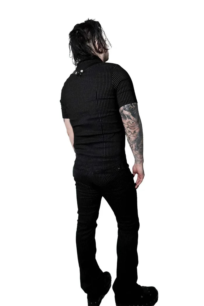 Model wearing a black and white pinstripe tip with tattoos on arms against a white background