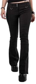 Model wearing black and white pinstripe pants on a white background