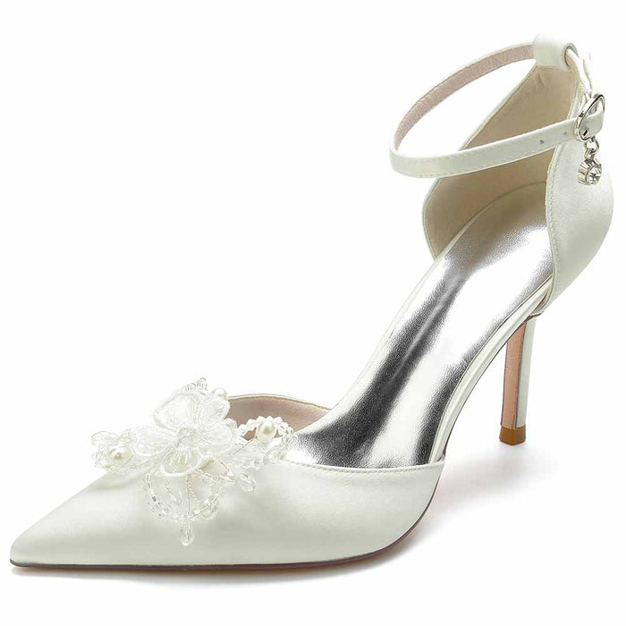 Elegant bridal satin point toe heels with delicate floral embellishments and ankle strap
