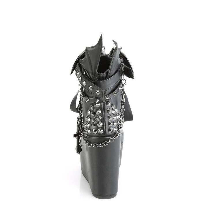 back view of 5" wedge platform Wedge ankle bootie style boot Features wrap around studded & spike straps Bat buckle detail Chain with various hanging charms Batwing detail up the back Inside metal zip closure.