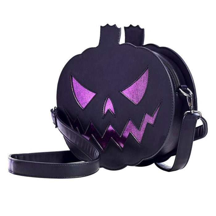 Matte black vinyl jack o lantern purse with sparkly glitter vinyl stitched details. Purse has adjustable strap, zip closure, leopard print satin lining and a zippered pocket on the inside. Can be worn as a cross body bag, or on the shoulder.