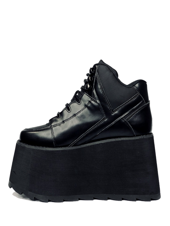 outer view of black vegan leather platform shoe with EVA platform. Shoe looks like a sneaker, but super tall! Shoe has nylon details and mesh lining. Bottom of platform has a "fanned" grip to make the platform more stable.