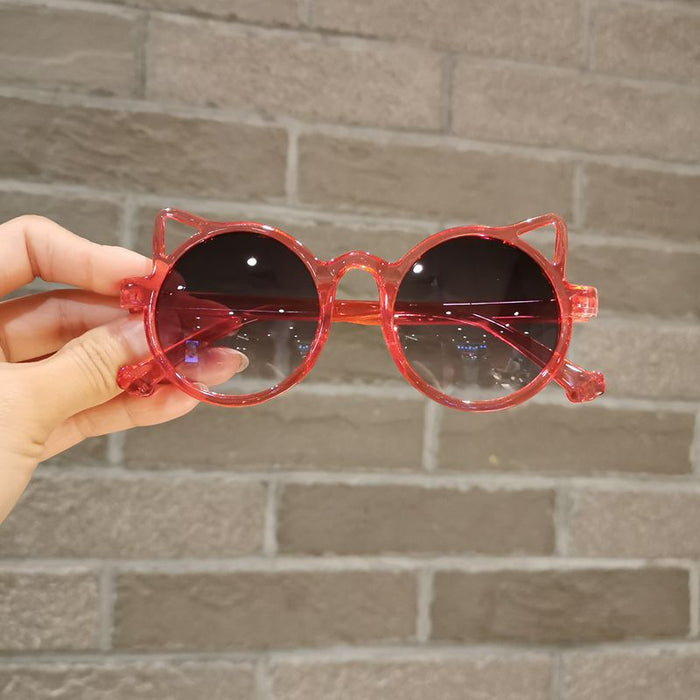 model holding glasses