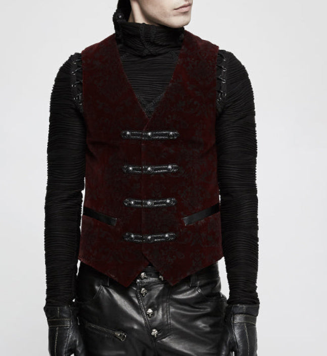 Person wearing a dark red vest with black accents on a white background