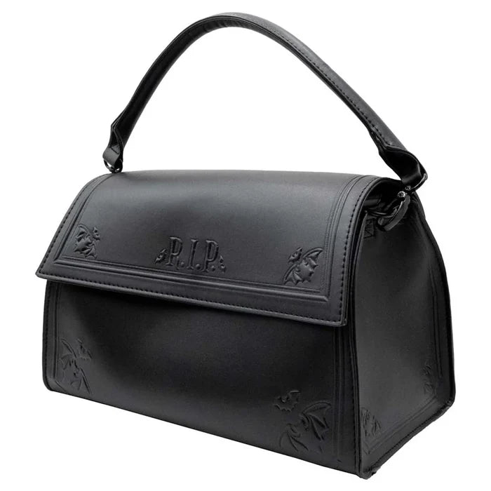 side of bag on display with white background