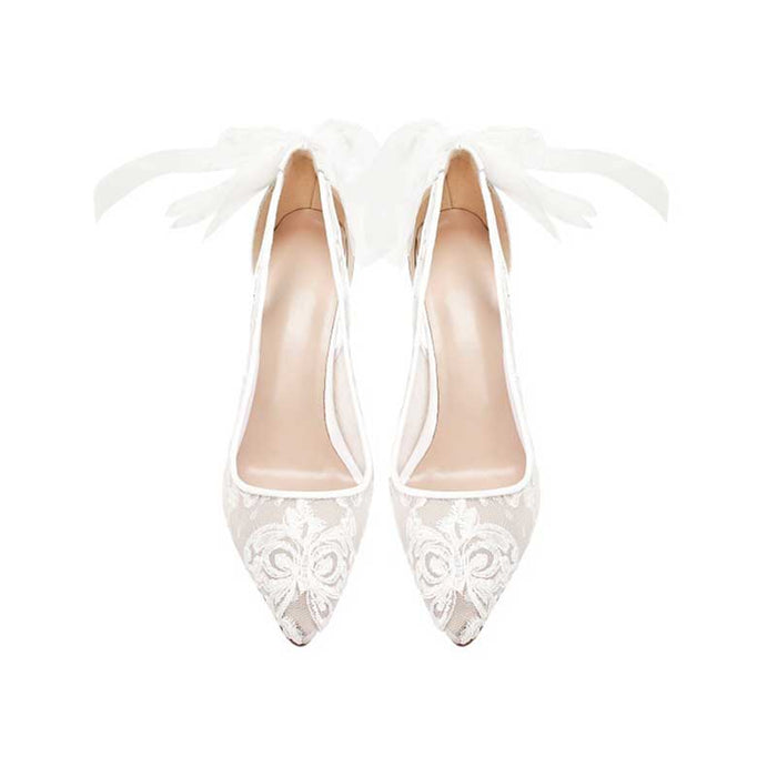 Elegant white lace bridal stilettos with satin bows by SD Dresscode & Fashiontrends for perfect wedding style