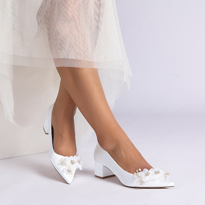 Elegant flower appliqué wedding heels in white with a chic pointy toe design