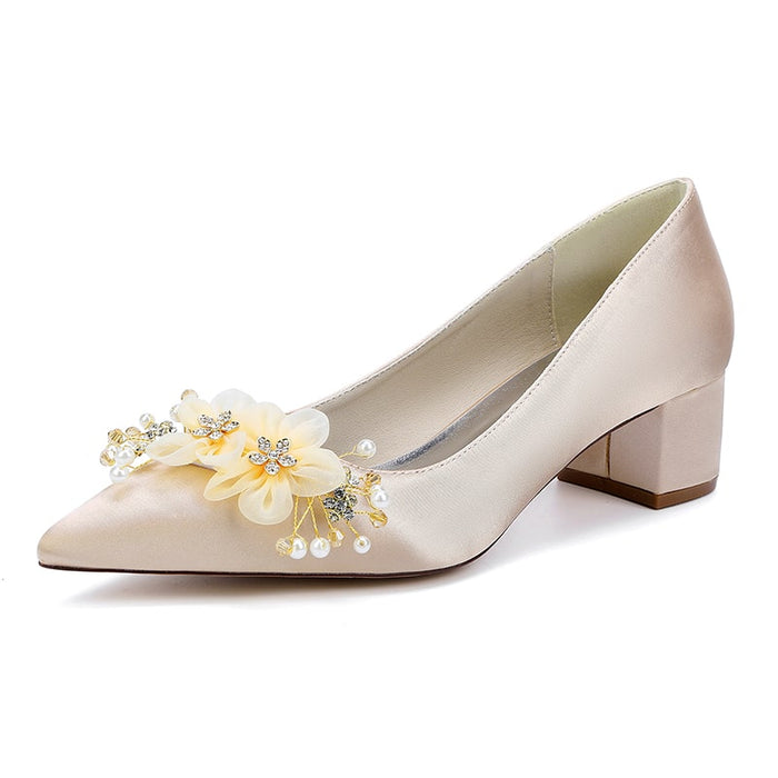 Elegant flower appliqué wedding heels with a decorative floral design and comfortable block heel