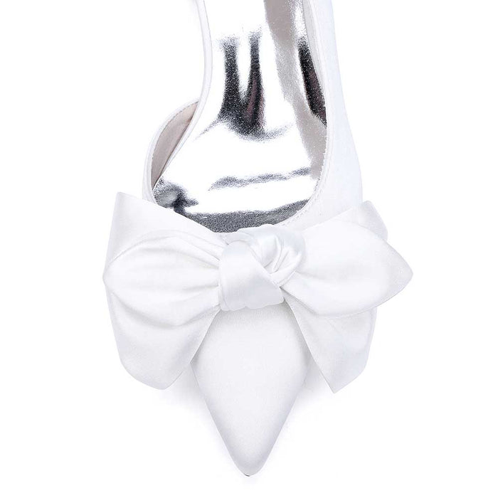 Elegant mid heel bridal shoes with bow in white featuring a sleek pointed toe design