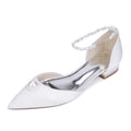 Elegant satin wedding flats with pearls and ankle chain for a stylish bridal look
