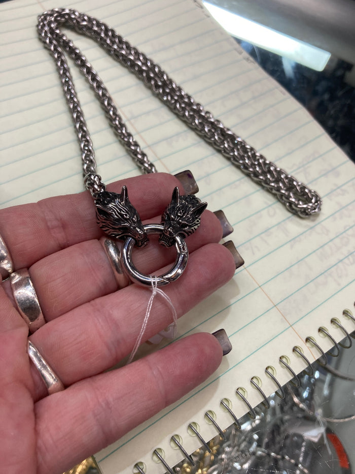 model holding necklace