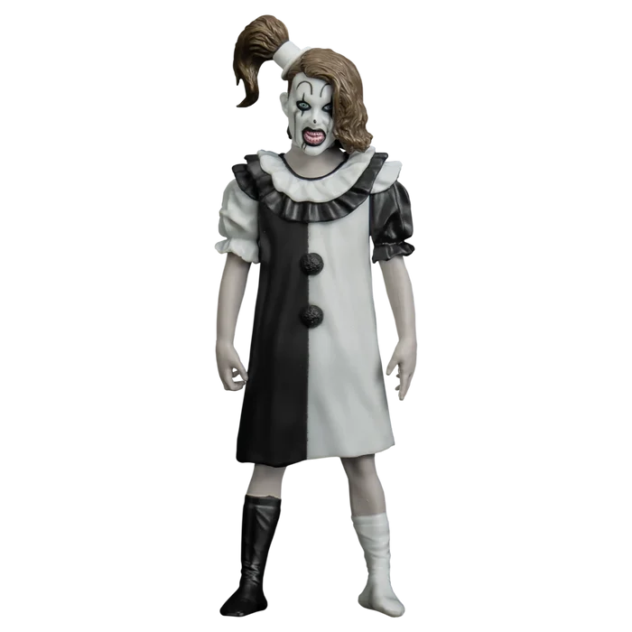 Figure in a clown costume with black and white dress on a white background