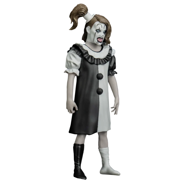 Figure in a clown costume with black and white dress on a white background