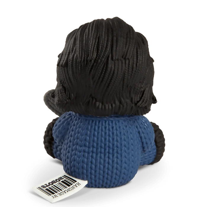 back of figure on display