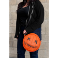 model with bag over shoulder