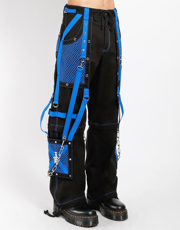 side of Black and blue studded pants zip off into shorts and feature removable chains, adjustable ankles, zippers, D-rings, and deep pockets.
