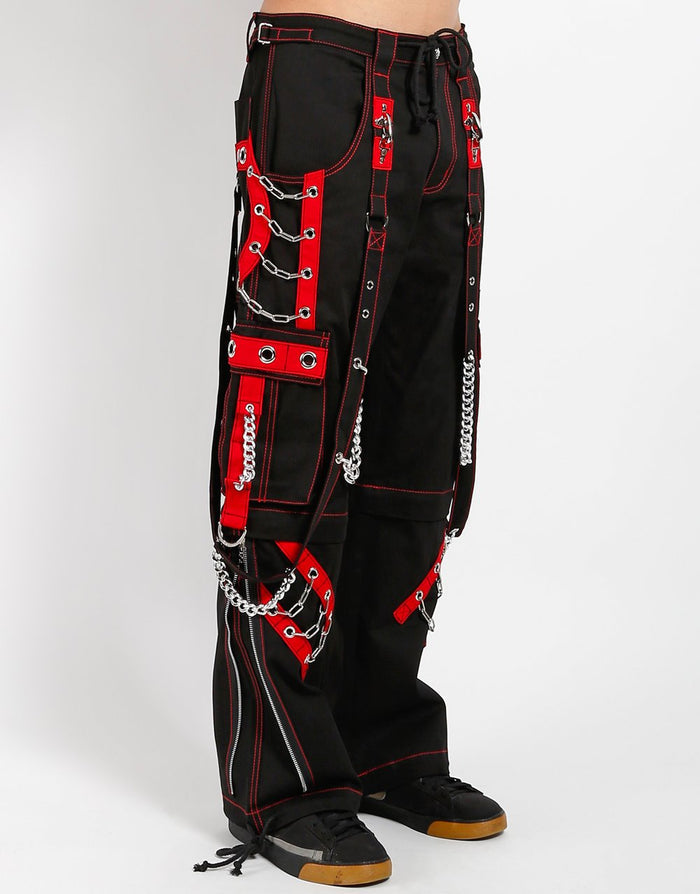 side of Black and red pants feature red stitching, removable straps, adjustable ankles, D-rings, clasps, and deep pockets.