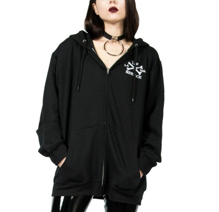 Black and white cross bones and dagger logo hoodie has print on the front and the back, with zip front closure and back hood.