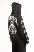 model showing back of hoodie