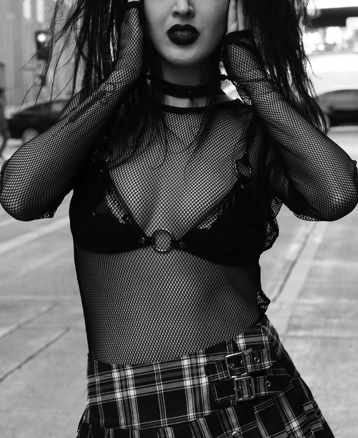 Long sleeve classic black stretch fishnet top.