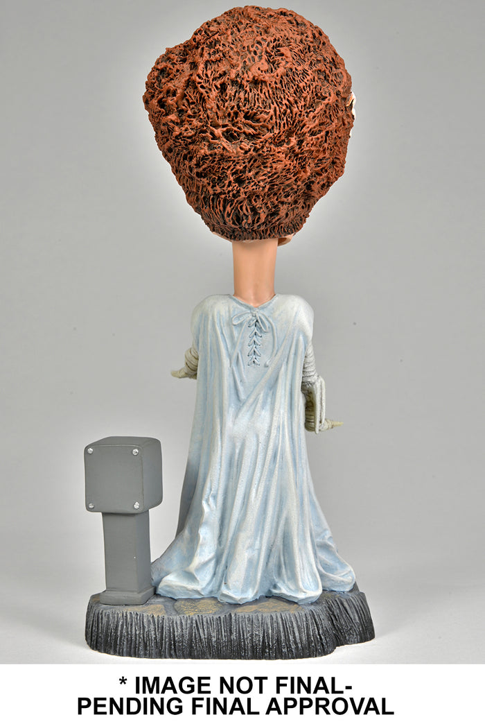 back of figure on display