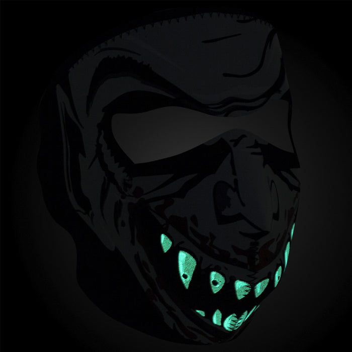 Full face riding mask with vampire glow in the dark design on front side. Can be reversed to an all black side.