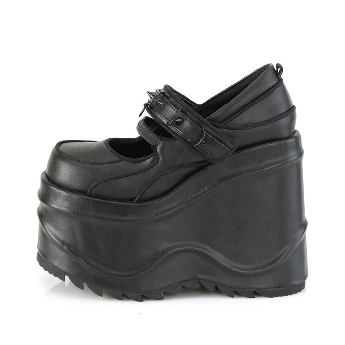 inner view of black leather 6" wedge platform  Mary Jane style Features elastic instep strap with hook & loop strap W/ cone spike stud & D-ring details