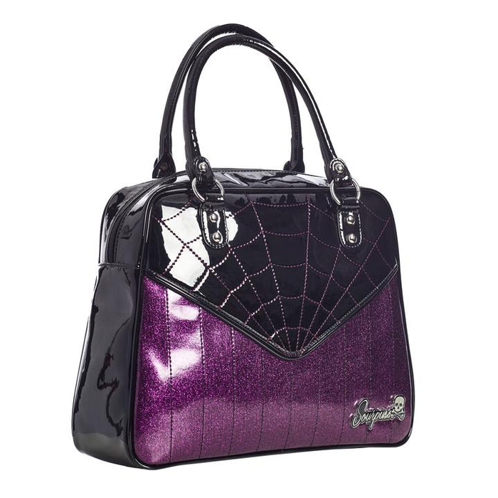 Glossy black vinyl and purple stitched spider webbing, along with contrast purple glitter panel with backseat stitching. Generously sized and can double as an overnight bag, complete with satin leopard liner and signature metal Sourpuss emblem and reinforced studded handles.